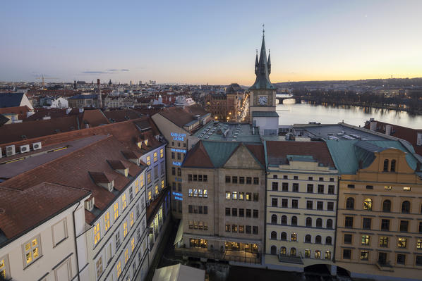 Sunset lights of winter on the historic old town framed by river Prague Czech Republic Europe