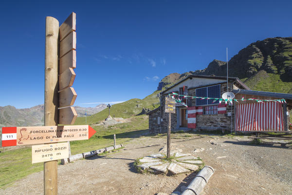 Signposting of hiking trails Rifugio Bozzi Val Di Viso Camonica Valley province of Brescia Lombardy Italy Europe