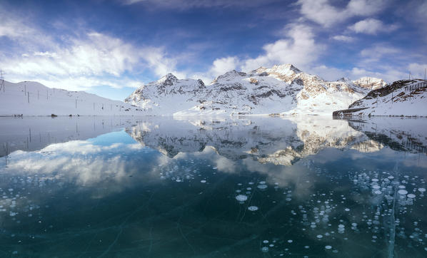 Panorama of ice bubbles and frozen surface of Lago Bianco at dawn Bernina Pass canton of Graubünden Engadine Switzerland Europe