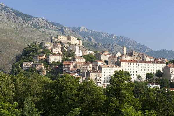 The old citadel of Corte perched on the hill surrounded by mountains Haute-Corse Corsica France Europe