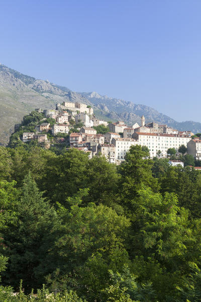 The old citadel of Corte perched on the hill surrounded by mountains Haute-Corse Corsica France Europe