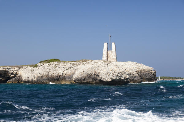 The turquoise sea frames the ancient towers perched on the white cliffs Lavezzi Islands Bonifacio Corsica France Europe