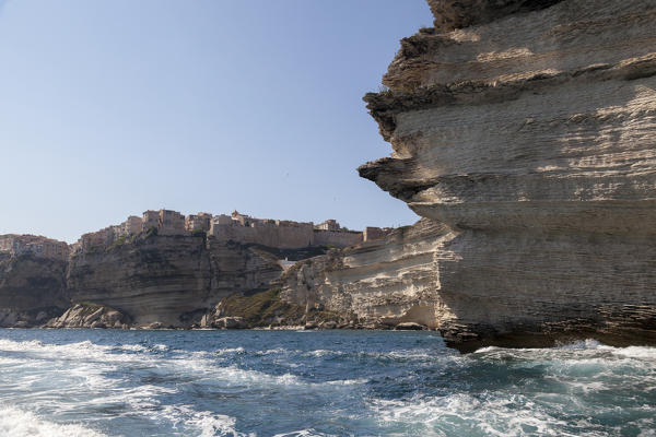 The turquoise sea frames the ancient village perched on the white cliffs Lavezzi Islands Bonifacio Corsica France Europe