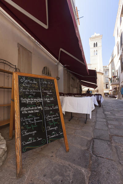 Typical medieval alleys and restaurants of the old town Bonifacio Corsica France Europe