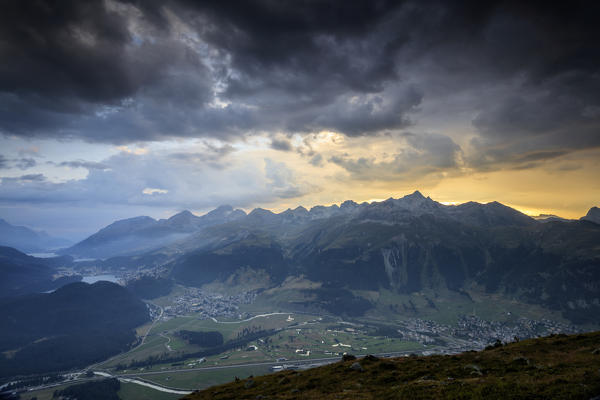 Sunset sky and dark clouds on the rocky peaks of Muottas Muragl St.Moritz Engadine Canton of Graubünden Switzerland Europe