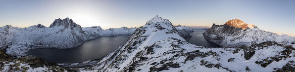 Panoramic view of the icy sea along the Mefjorden to Ornfjorden towards the peak of Mount Barden Senja Tromsø Norway Europe