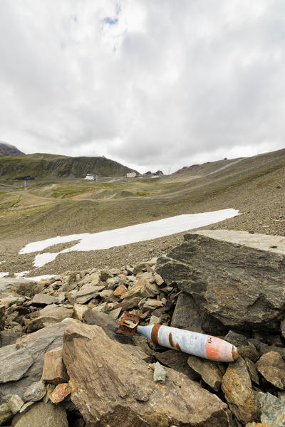 A bomb of World War I on the rocky mountains Braulio Valley Stelvio Pass Valtellina Lombardy Italy Europe