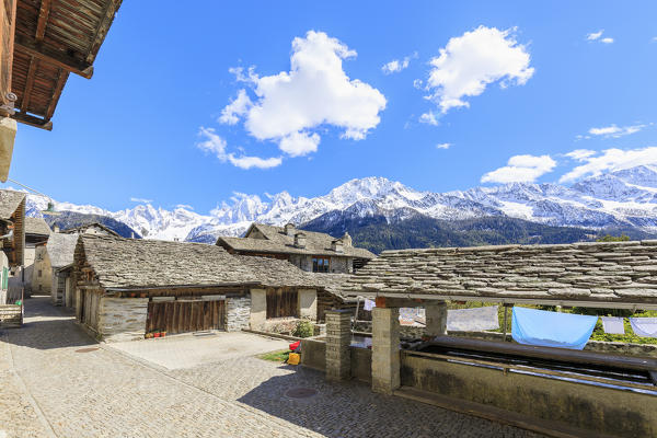 Blue sky in spring on the ancient alpine village Soglio Maloja canton of Graubunden Engadin Bregaglia Valley Switzerland Europe