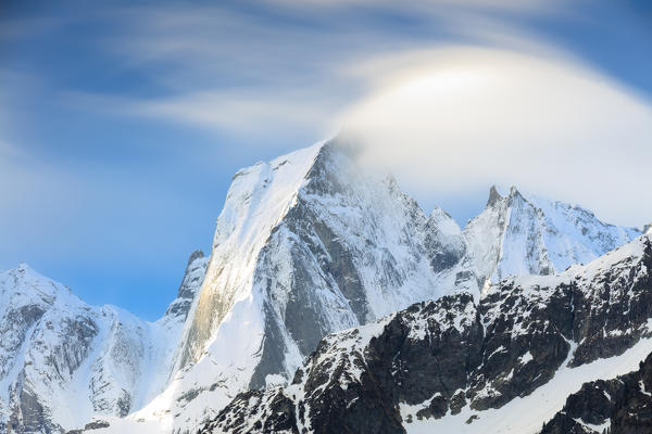View of peak Badile covered with snow in spring Maloja canton of Graubunden Engadin Bregaglia Valley Switzerland Europe