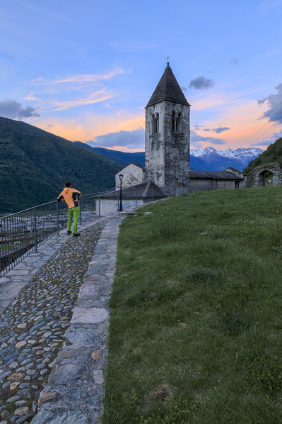 Dawn on stone footpath leading to Xenodochio of Santa Perpetua, Tirano, province of Sondrio, Valtellina Lombardy, Italy, Europe