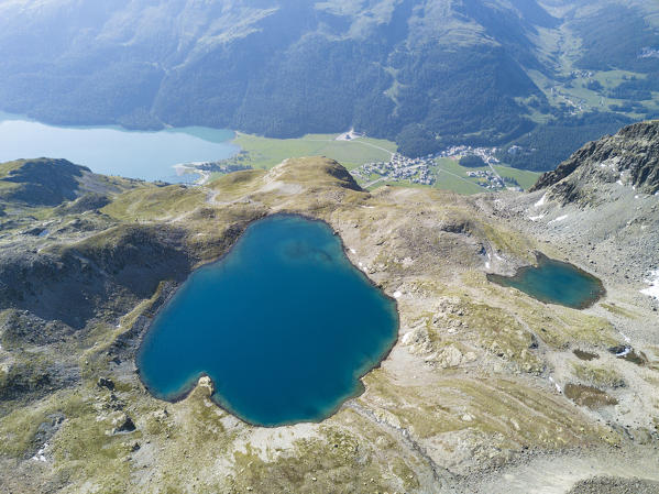 Aerial view of the blue water of Lej da la Tscheppa, St. Moritz, Engadine, canton of Graubünden, Switzerland, Europe