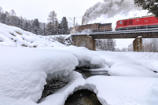 Steam of the snowplow of the Bernina Express train, Morteratsch, canton of Graubünden, Engadin Valley, Switzerland