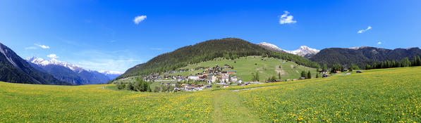 Panoramic of the alpine village of Davos Wiesen in spring, Canton of Graubünden, Prettigovia Davos Region, Switzerland