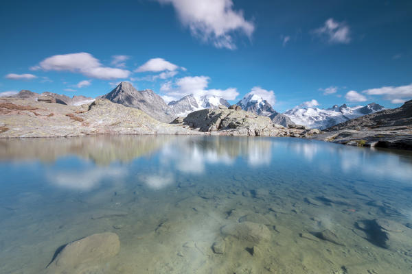 Piz Bernina reflected in water, Fuorcla Surlej, Corvatsch, canton of Graubünden, Engadine, Switzerland