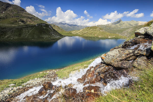 Water flows on mountain rocks, Leg Grevasalvas, Julierpass, Maloja, canton of Graubünden, Engadine, Switzerland
