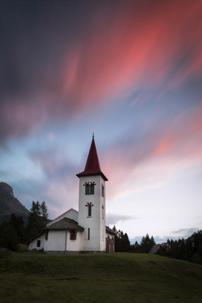 Pink clouds at sunset on Chiesa Bianca, Maloja, Bregaglia Valley, Canton of Graubünden, Engadin, Switzerland