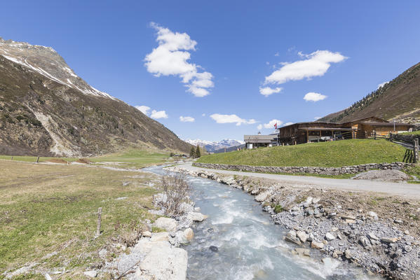 Alpine village of Davos on the shore of river Landwasser, Sertig Valley, canton of Graubünden, Switzerland