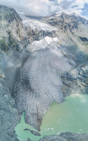 Panoramic aerial view of the glacial lake at the foot of Fellaria Glacier, Malenco Valley, Valtellina, Lombardy, Italy