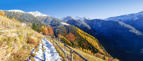 An early snowfall painting the landscape in the Albaredo Valley of Bitto in the Orobie alps  Valtellina, Sondrio, Lombardy, Italy Europe