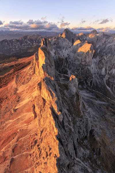 Aerial view of the rocky peaks of Roda Di Vael at sunset, Catinaccio Group (Rosengarten), Dolomites, South Tyrol, Italy