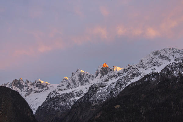 Snowy peaks Badile and Cengalo at sunset, Soglio, Bregaglia Valley, Maloja Region, Canton of Graubunden, Switzerland
