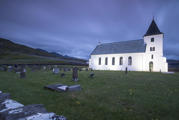 Church of Eidi and cemetery at dusk, Eysturoy Island, Faroe Islands