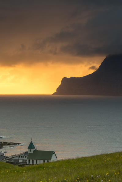 Church on the ocean shore towards Kalsoy Island, Gjogv, Eysturoy Island, Faroe Islands