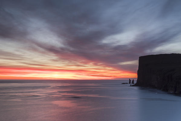 Cliffs of Risin og Kellingin at sunrise seen from Tjornuvik, Streymoy Island, Faroe Islands