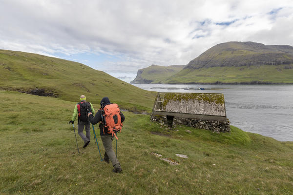 Trekkers during the Drangarnir excursion, Vagar Island, Faroe Islands