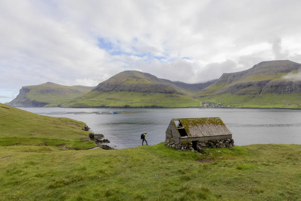 Photographer during the Drangarnir excursion, Vagar Island, Faroe Islands
