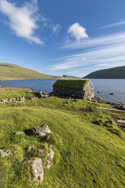 Isolated house on the shore of lake Sorvagsvatn, Vagar Island, Faroe Islands