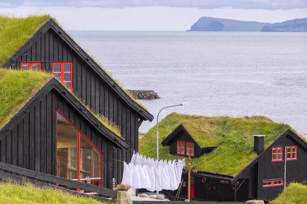Traditional houses with grass roof, Kirkjubour, Streymoy island, Faroe Islands, Denmark