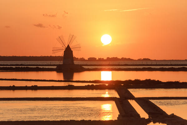 Windmill at sunset, Saline dello Stagnone, Marsala, province of Trapani, Sicily, Italy