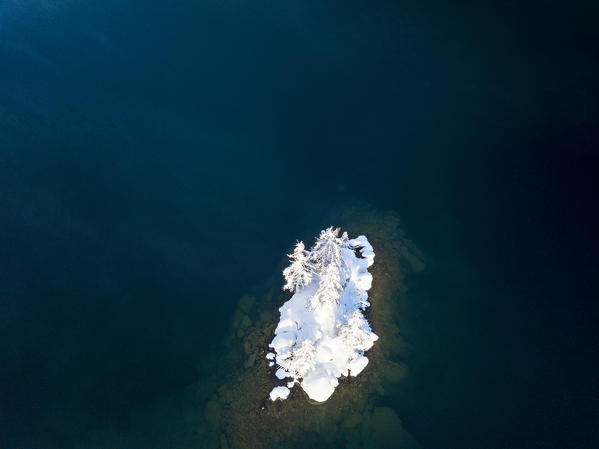 Aerial view of frozen trees in Lake Sils, Plaun da Lej, Maloja Region, Canton of Graubunden, Engadin, Switzerland