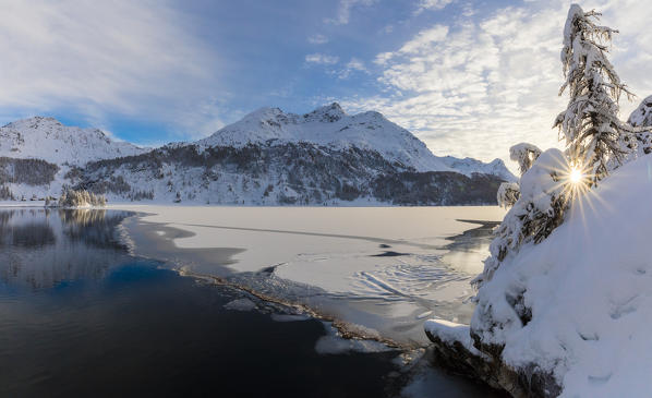 Panoramic of frozen Lake Sils, Plaun da Lej, Maloja Region, Canton of Graubunden, Engadin, Switzerland
