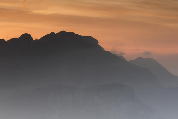 Silhouette of Monte Resegone at sunrise seen from Monte Coltignone, Lecco, Lombardy, Italy