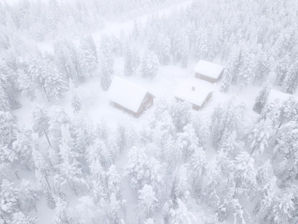 Aerial view of huts in the snow covered forest, Levi, Kittila, Lapland, Finland