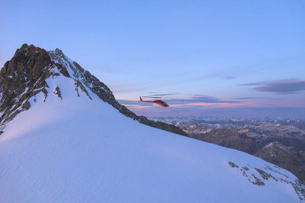 Aerial view of helicopter in flight on Piz Bernina, Valmalenco, Lombardy, border of Italy and Switzerland