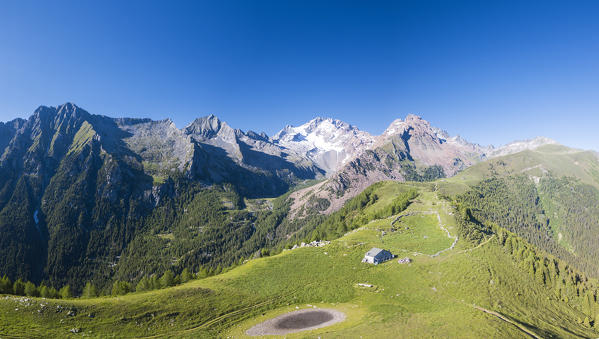 Panoramic aerial view of Scermendone Alp and Monte Disgrazia, Sondrio province, Valtellina, Rhaetian Alps, Lombardy, Italy