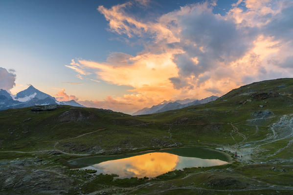 Sunset over the alpine lake Riffelsee, Zermatt, canton of Valais, Switzerland