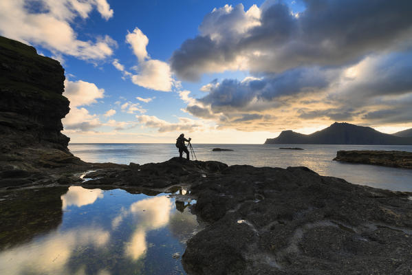 Photographer oceanfront, Gjogv, Eysturoy island, Faroe Islands, Denmark