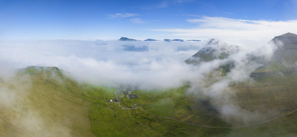 Aerial panoramic of clouds above Gjogv, Eysturoy island, Faroe Islands, Denmark