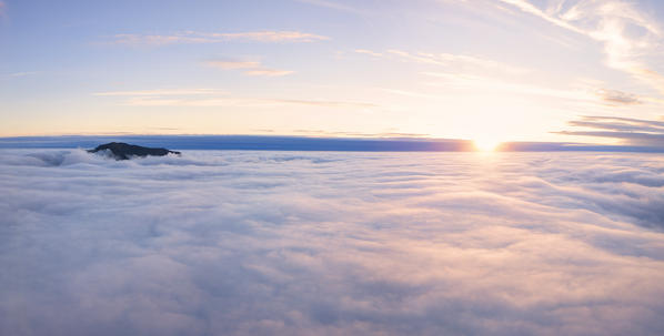 Aerial panoramic of clouds above Gasadalur, Vagar island, Faroe Islands, Denmark