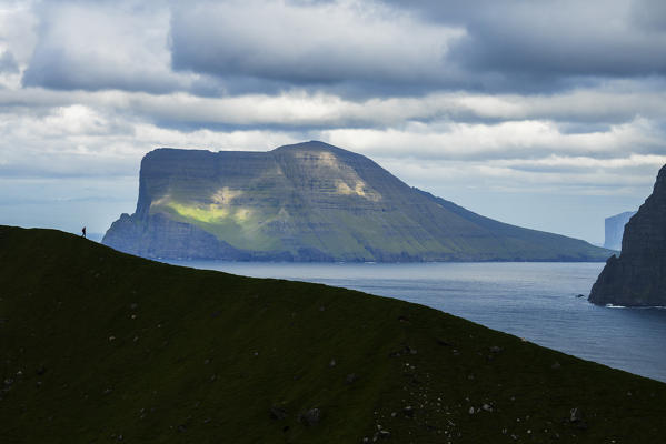 Clouds on Vidoy island seen from Kalsoy island, Faroe Islands, Denmark