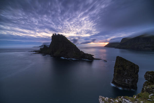 Drangarnir and Tindholmur islet at dusk, Vagar island, Faroe Islands, Denmark