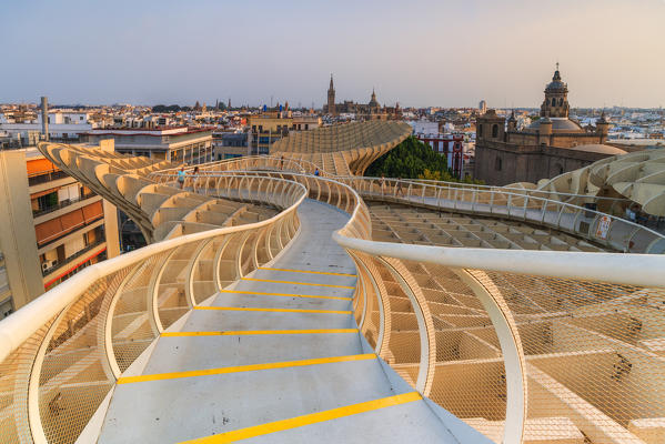 Spiral shape curved footbridge of Metropol Parasol (Setas de Sevilla), Plaza de la Encarnacion, Seville, Andalusia, Spain