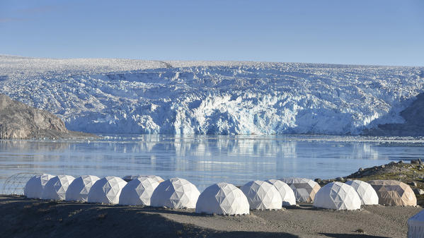 Glacial front with dome tents, Qaleraliq glacier camp,Greenland