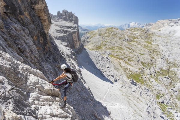 a climber along the via ferrata Lipella on the Tofana di Rozes, Belluno province, Veneto, Italy
