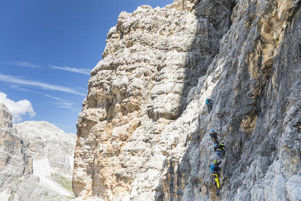 climbers along the via ferrata Lipella on the Tofana di Rozes , Belluno province, Veneto, Italy