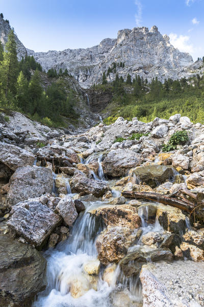 a brook into the Natural Park Puez Geisler with the Aferer Geisler in the background, Bolzano province, South Tyrol, Trentino Alto Adige, Italy